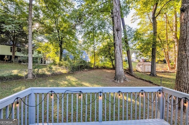 view of yard with a wooden deck