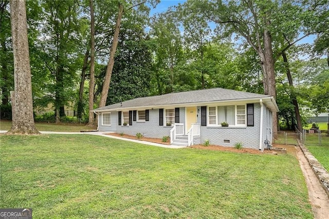 ranch-style house with a front lawn