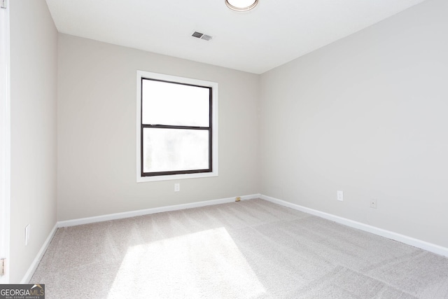 unfurnished room featuring carpet floors