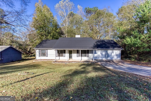 view of front of home with covered porch and a front yard