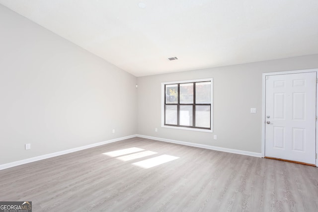 unfurnished room featuring light hardwood / wood-style floors