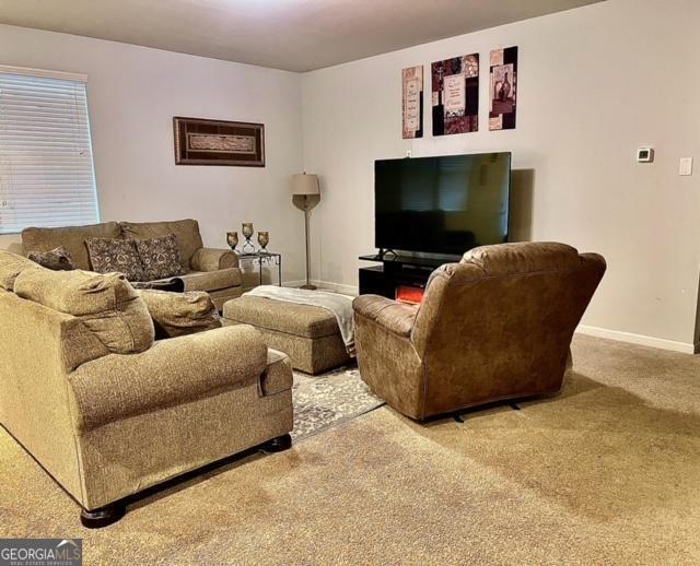 living room featuring carpet floors