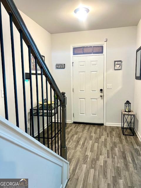 foyer featuring dark hardwood / wood-style flooring