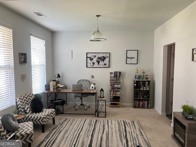 view of carpeted home office