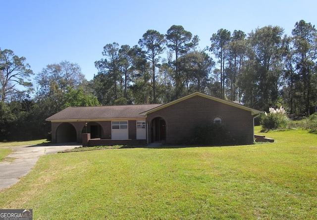 single story home featuring a front yard and a carport