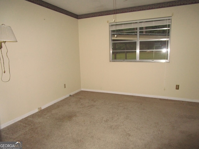 empty room featuring carpet flooring