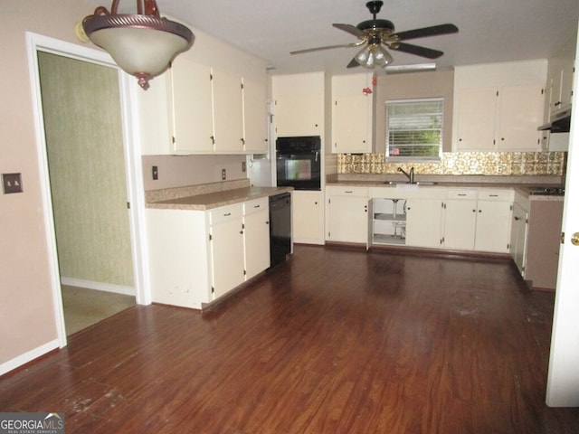 kitchen featuring black appliances, white cabinetry, dark wood-type flooring, and ceiling fan