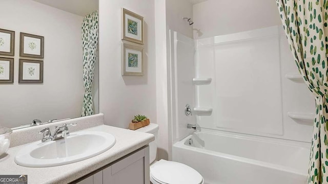 full bathroom featuring vanity, toilet, and shower / bathtub combination with curtain