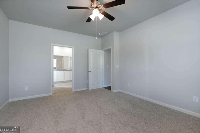 unfurnished bedroom featuring carpet flooring and ceiling fan