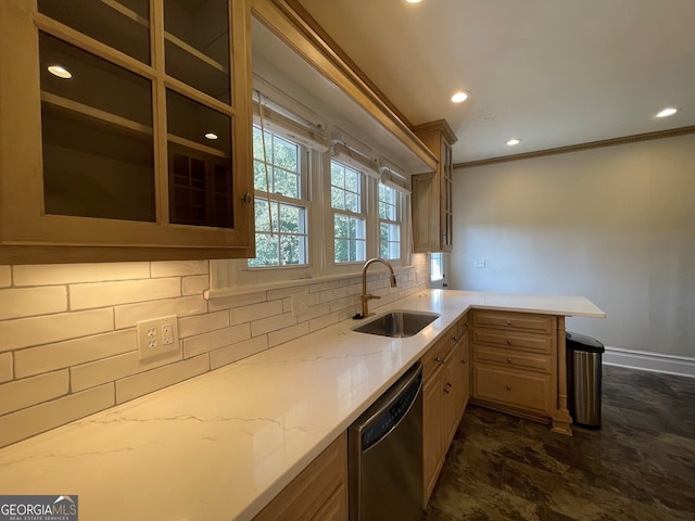 kitchen featuring decorative backsplash, ornamental molding, sink, light stone countertops, and stainless steel dishwasher