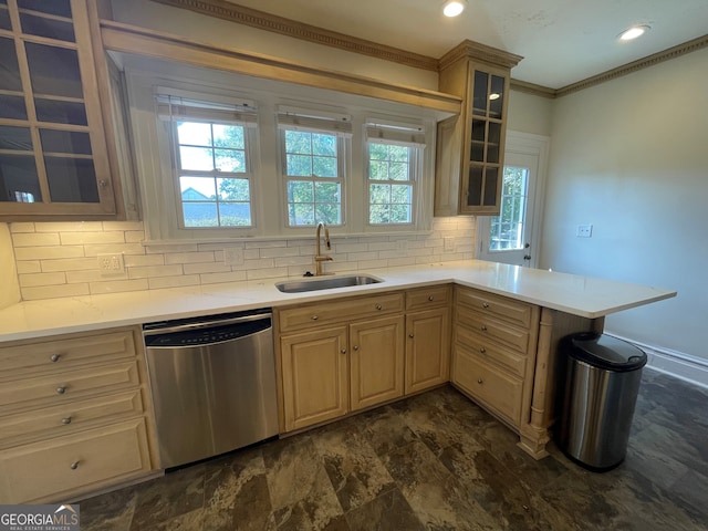 kitchen featuring kitchen peninsula, light brown cabinetry, ornamental molding, dishwasher, and sink