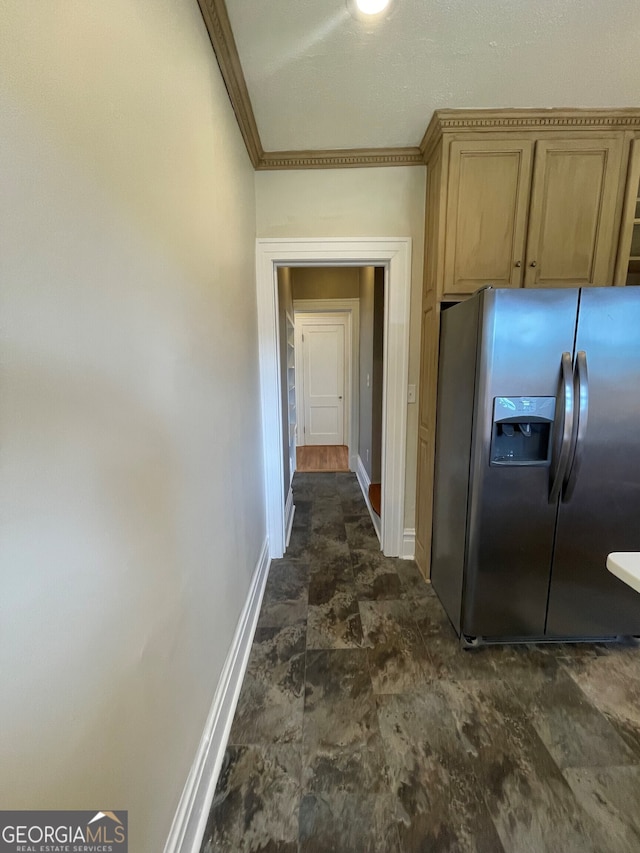 hall featuring ornamental molding