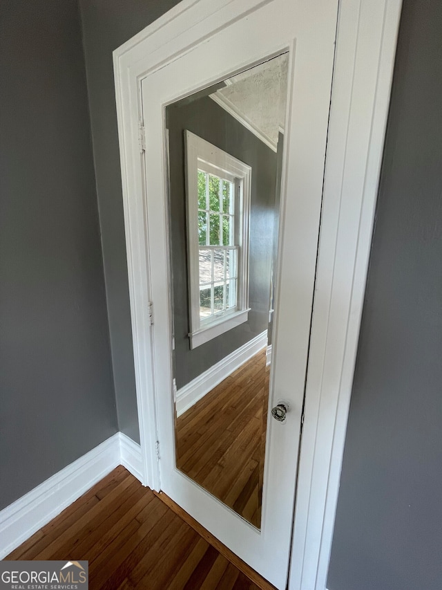 interior details featuring hardwood / wood-style floors