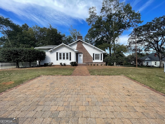 view of front of home with a front yard
