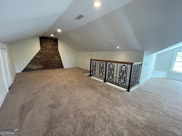 425 E 9th St SE, Rome, GA 30161 - bonus room with carpet floors, vaulted ceiling, baseboards, brick wall, and recessed lighting
