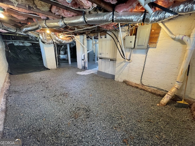 basement featuring electric panel