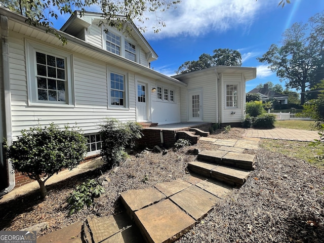 rear view of house featuring a patio