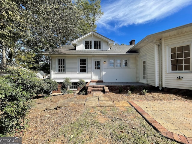 view of front of home featuring a patio