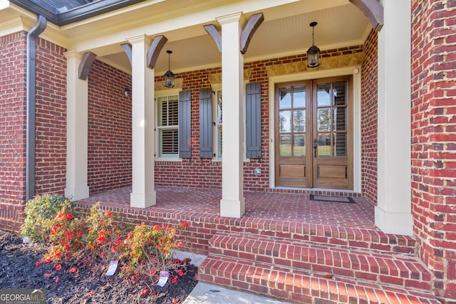 entrance to property featuring french doors and a porch