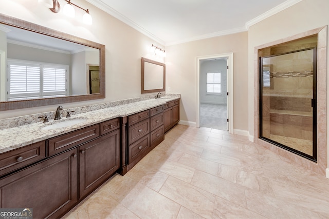 bathroom with plenty of natural light and crown molding