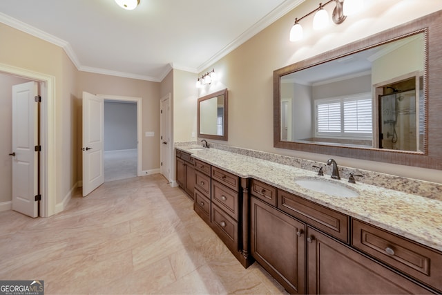 bathroom with vanity and ornamental molding