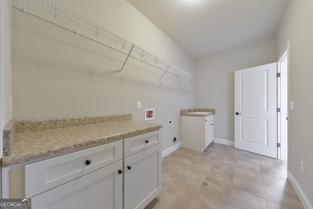 laundry room with electric dryer hookup and washer hookup