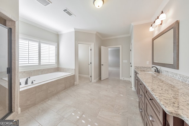 bathroom with vanity, a relaxing tiled tub, and ornamental molding