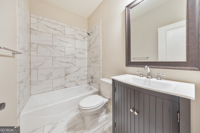 full bathroom with vanity, tiled shower / bath combo, and toilet