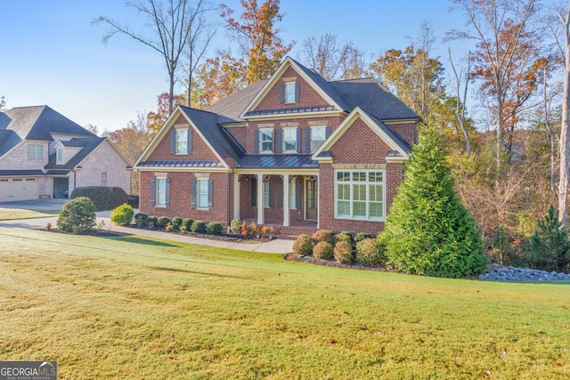 craftsman inspired home with a front yard