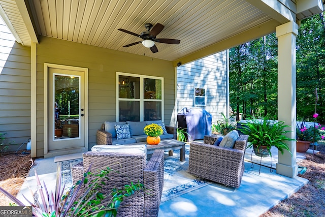 view of patio featuring an outdoor living space, ceiling fan, and grilling area