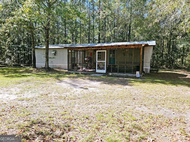 exterior space featuring a yard