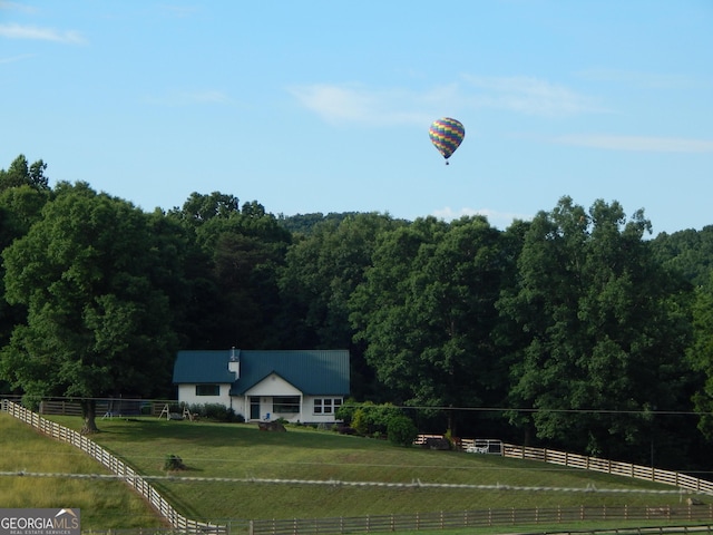 exterior space with a rural view