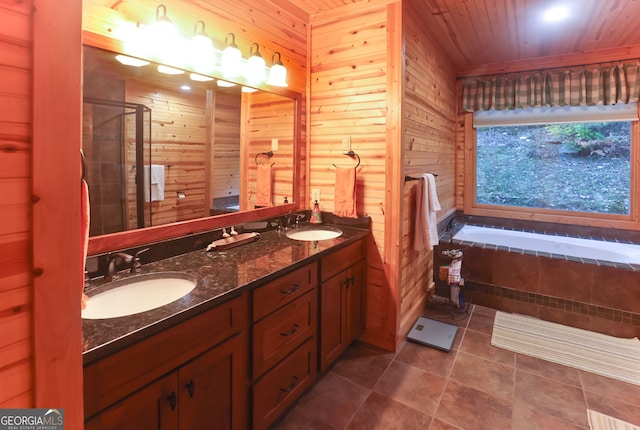 bathroom featuring tile patterned floors, wooden ceiling, vanity, wooden walls, and plus walk in shower