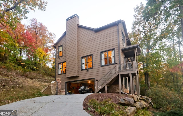 view of side of home with a garage