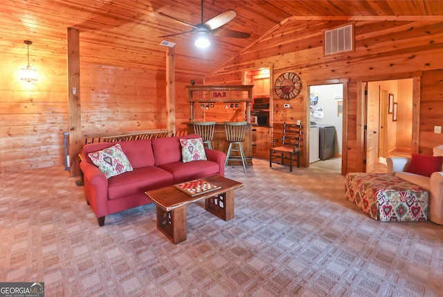 carpeted living room with wood ceiling, ceiling fan, lofted ceiling, and wood walls