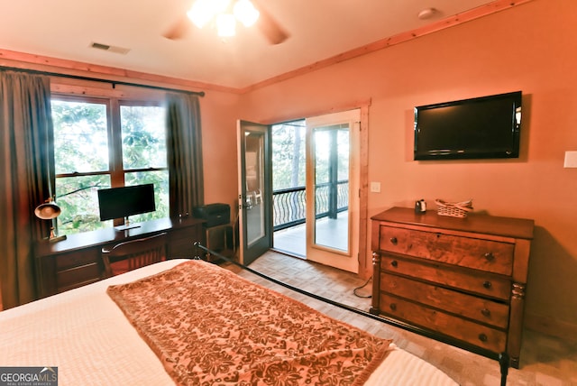 bedroom with multiple windows, access to outside, and ceiling fan