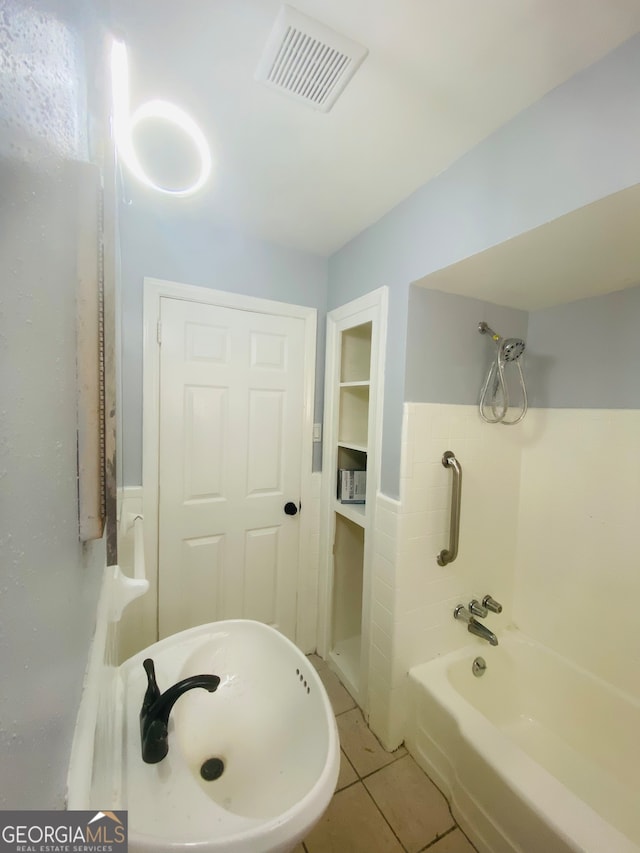 bathroom featuring tile patterned flooring