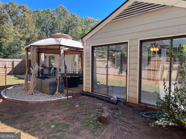 view of yard featuring a gazebo and a patio area