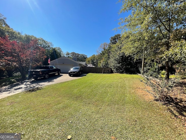 view of yard featuring a garage