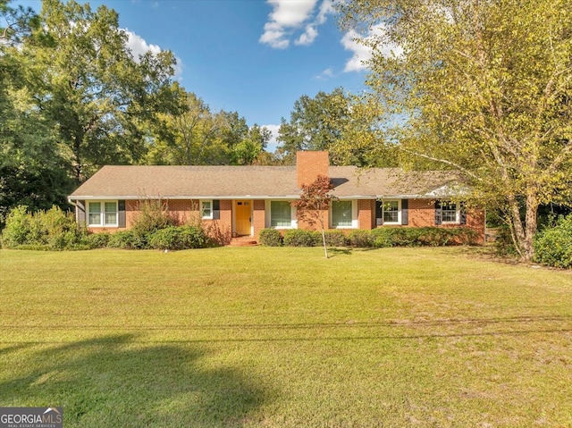 single story home with a front yard