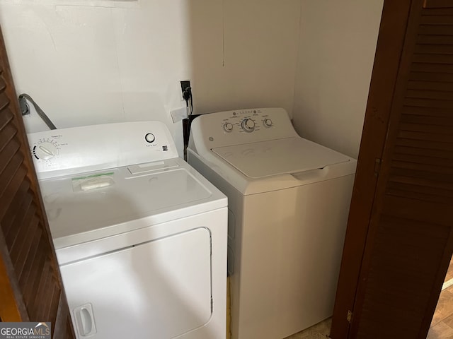 laundry area with washer and clothes dryer