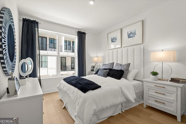 bedroom with light hardwood / wood-style flooring