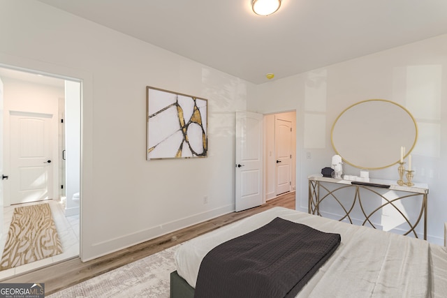 bedroom featuring hardwood / wood-style floors