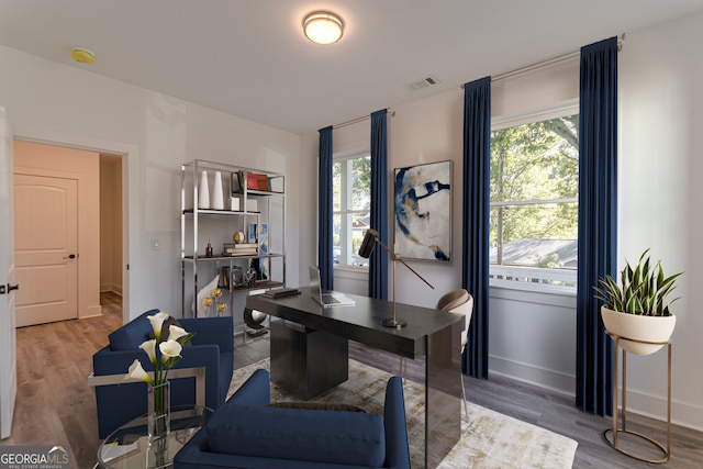 office area with hardwood / wood-style flooring