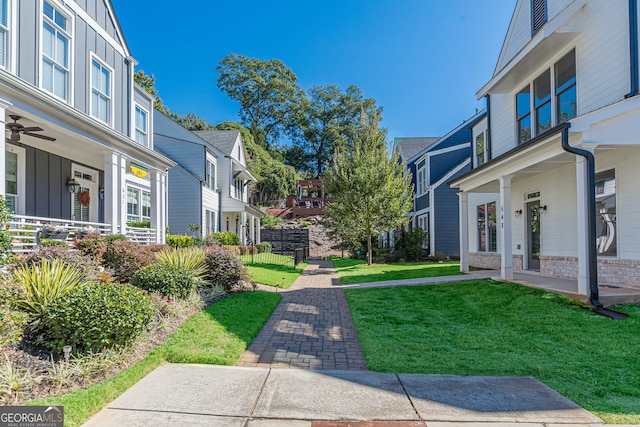 view of yard featuring ceiling fan