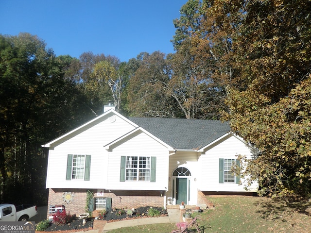 bi-level home featuring central air condition unit