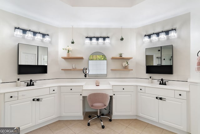 bathroom featuring tile patterned floors and vanity