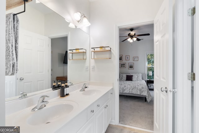 bathroom with ceiling fan and vanity