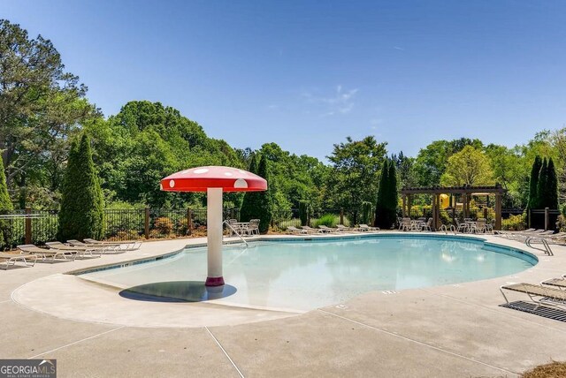 view of pool featuring a pergola and a patio area