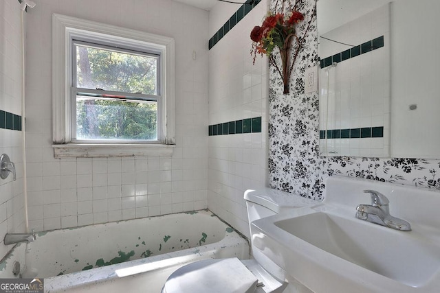 bathroom featuring toilet and sink